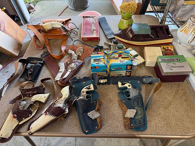 Selling years of treasures cap guns /Fishing tackle /porcelain dishes cover